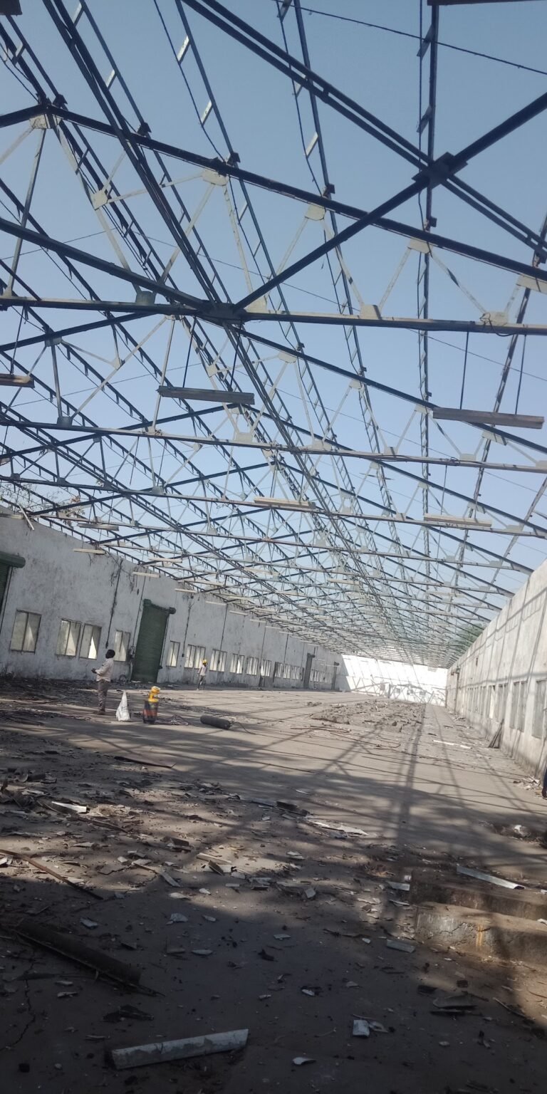 Long-span steel roof trusses over an industrial shed